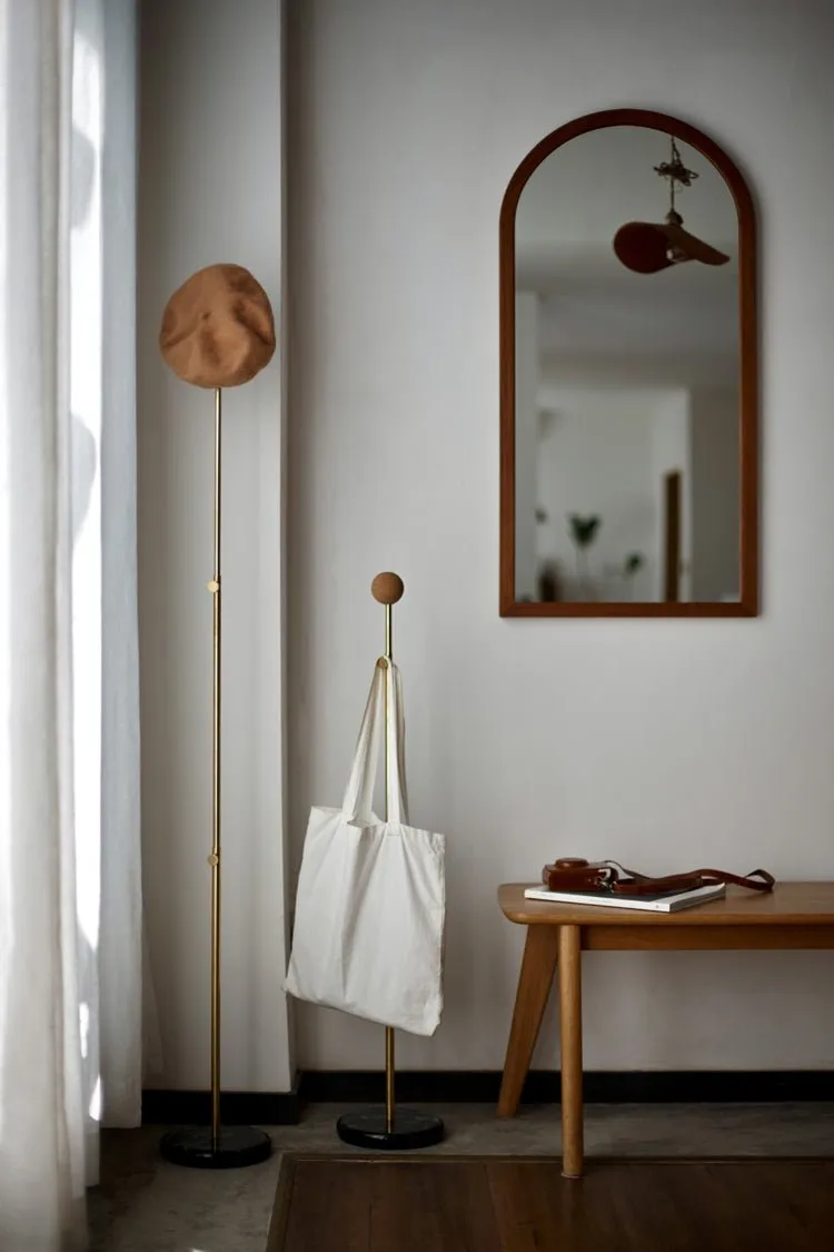 The Art of Hanging: Adjustable Brass Coat Hangers